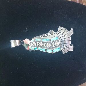 Navajo Maiden Pendant by Richard Begay with turquoise and sterling silver.